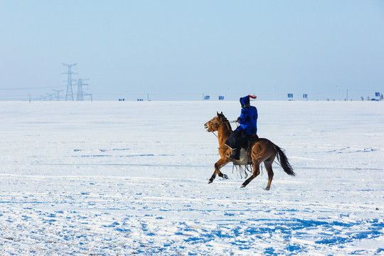 雪原蒙古族骑马