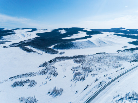 航拍冬季雪山森林