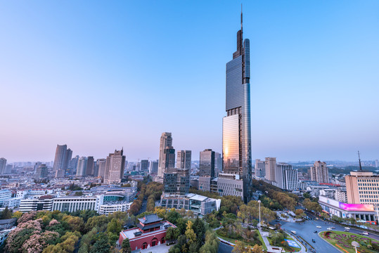 夕阳下中国南京鼓楼与CBD大厦