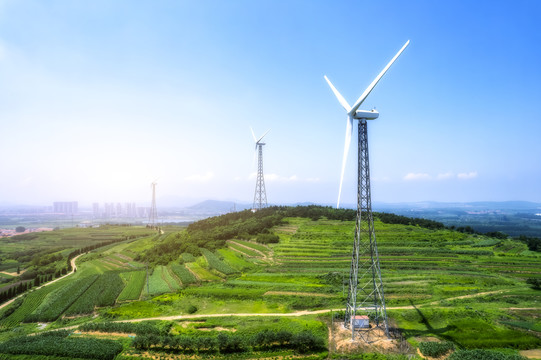 航拍农田绿色能源风力发电机