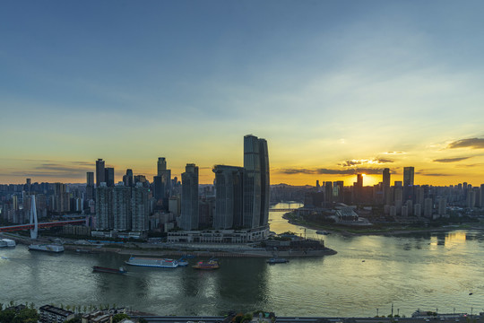 重庆来福士日落夜景摄影图