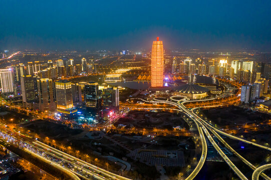 航拍郑州大玉米夜晚繁华都市圈