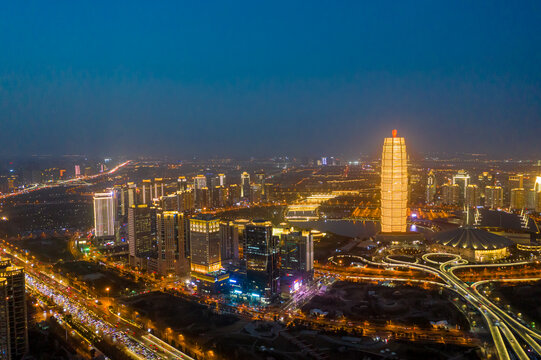 航拍郑州大玉米夜晚繁华都市圈