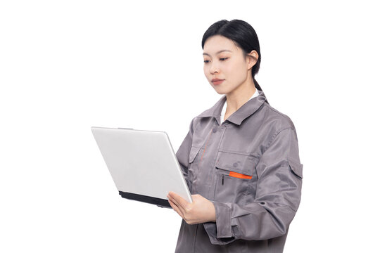 职业工装的女性使用笔记本电脑