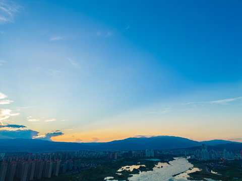 航拍日落時(shí)景洪市城市風(fēng)光