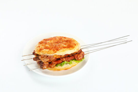 羊肉串夾饃