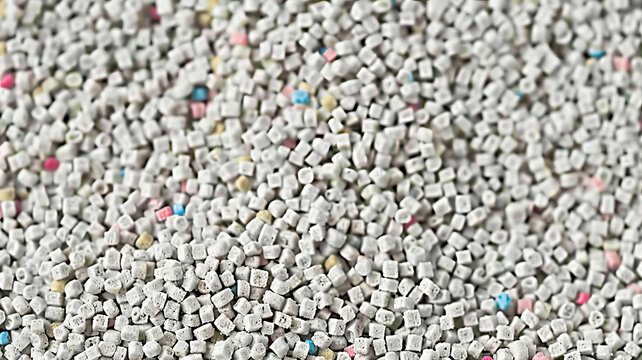 許多五顏六色的塑料顆粒的近照