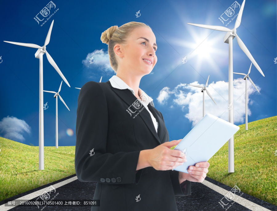 金發(fā)女商人抱著平板復(fù)合圖像