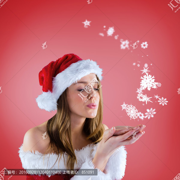 漂亮女人吹著雪花的復合形象