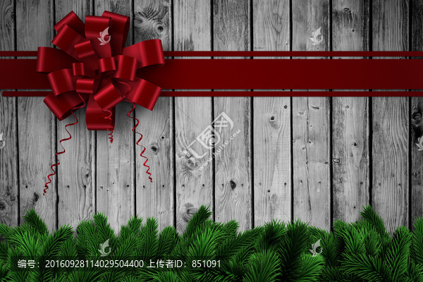 杉木樹枝和紅色的圣誕絲帶