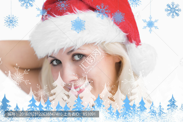 金發(fā)女人戴著圣誕帽的復(fù)合形象