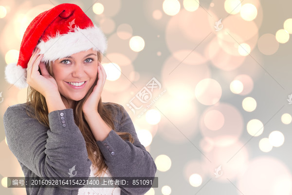 金發(fā)女人戴著圣誕帽的復合形象