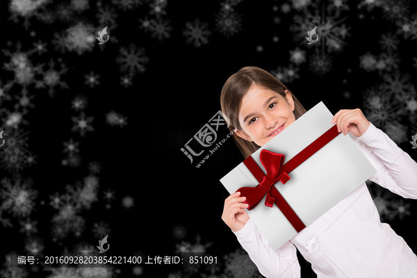 圣誕節(jié)拿卡片的小女孩