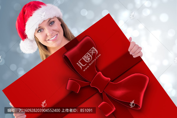 圣誕節(jié)拿著禮物的美女