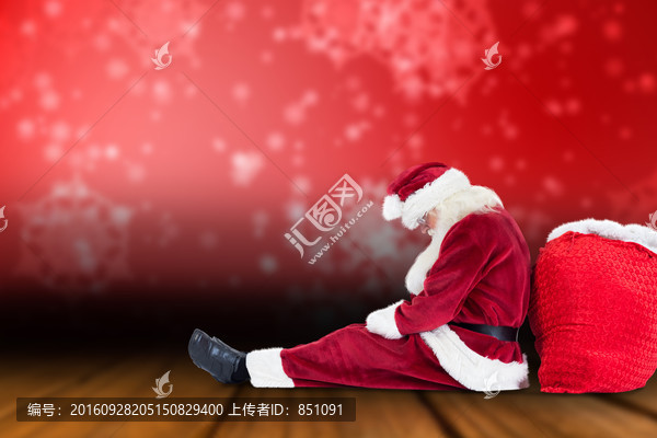 圣誕老人坐在地上的復(fù)合形象