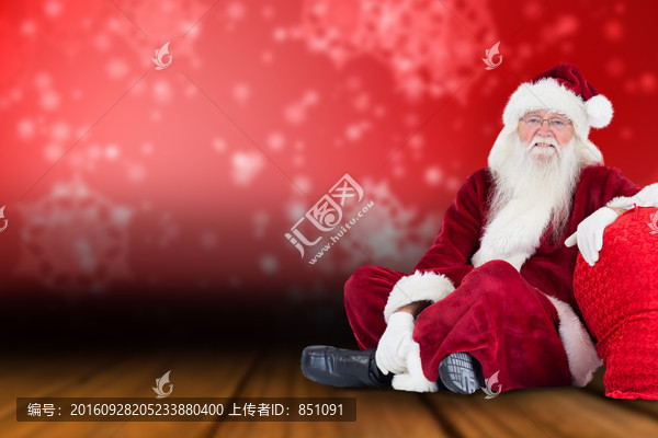 圣誕老人坐在地上的復(fù)合形象