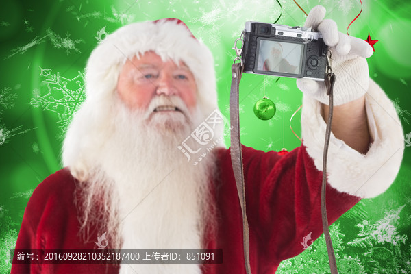 圣誕老人拿著相機自拍的復(fù)合形象