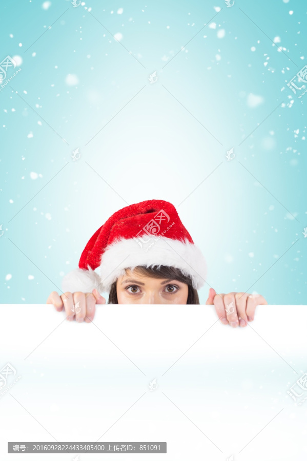 女人戴著圣誕帽的復(fù)合形象