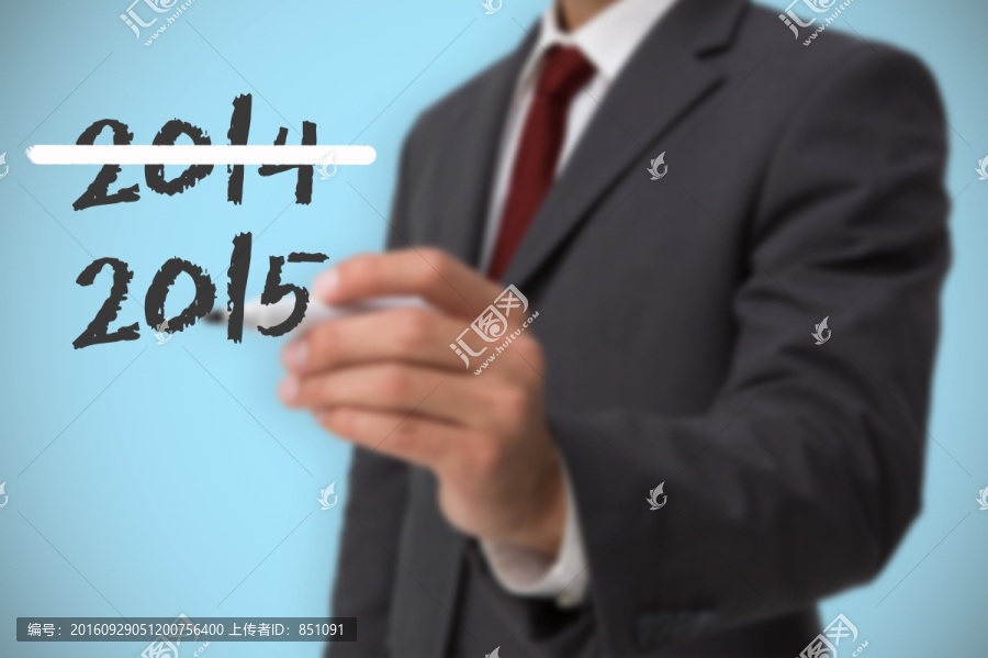 商人拿著筆書寫的復(fù)合形象