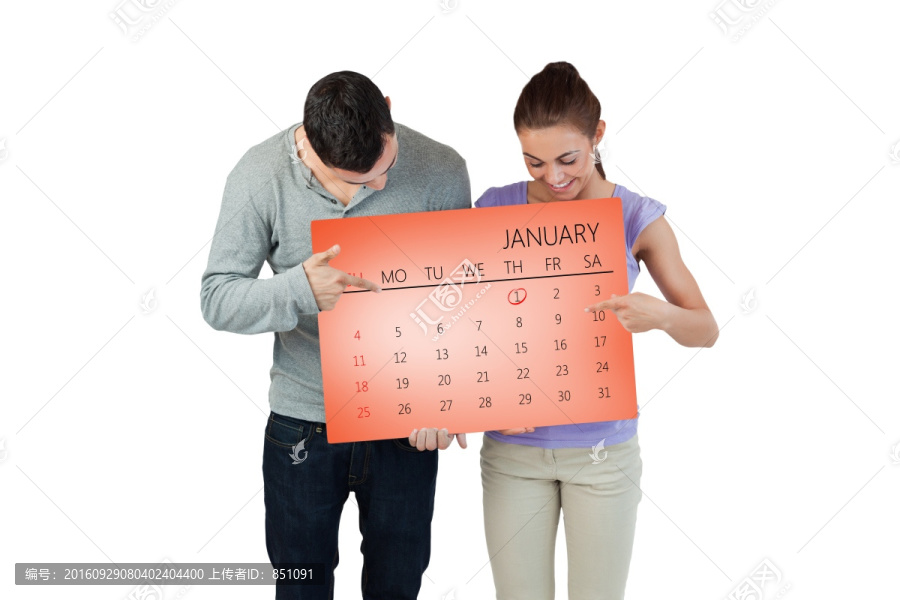 指著日歷的夫婦