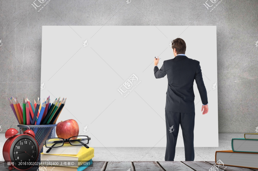 男人拿著筆書寫的復(fù)合形象