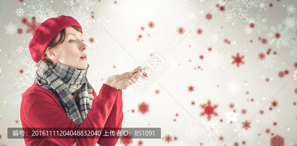 吹著雪花片的女人