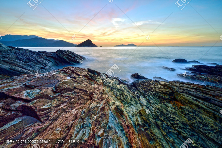 大海上日出礁岩石海浪jpg