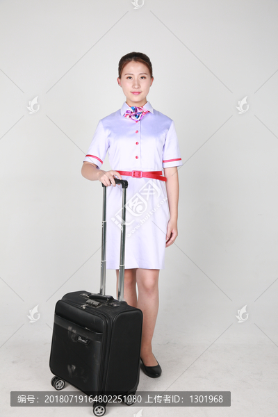 年轻空姐制服摄影图