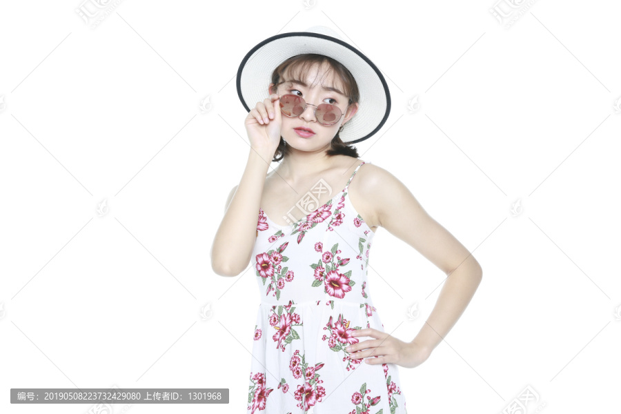 戴沙滩帽的女孩图片