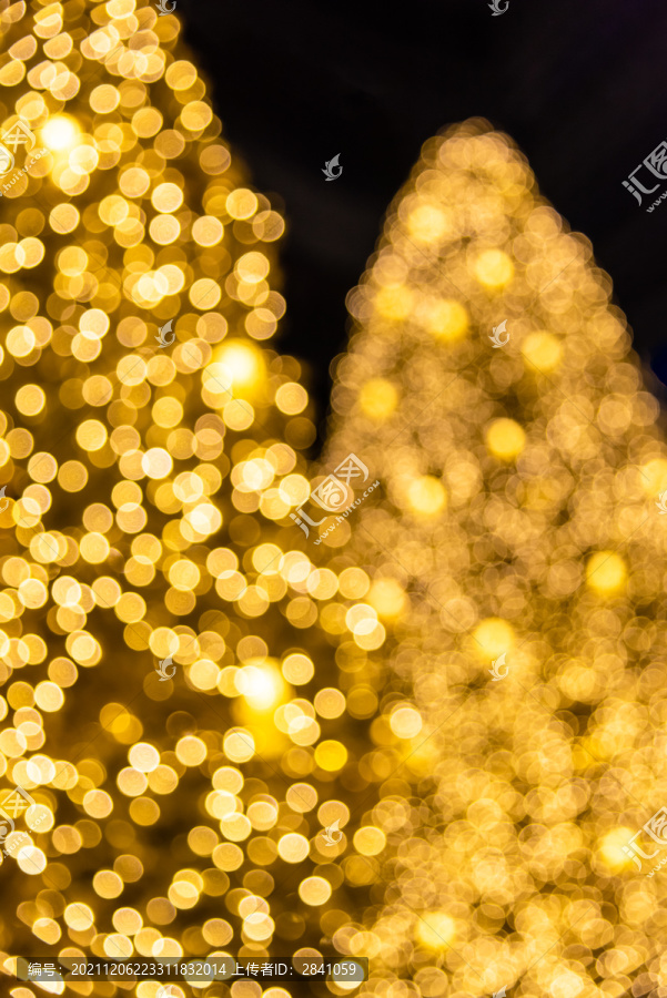 模糊虚幻的金色圣诞树光斑粒子