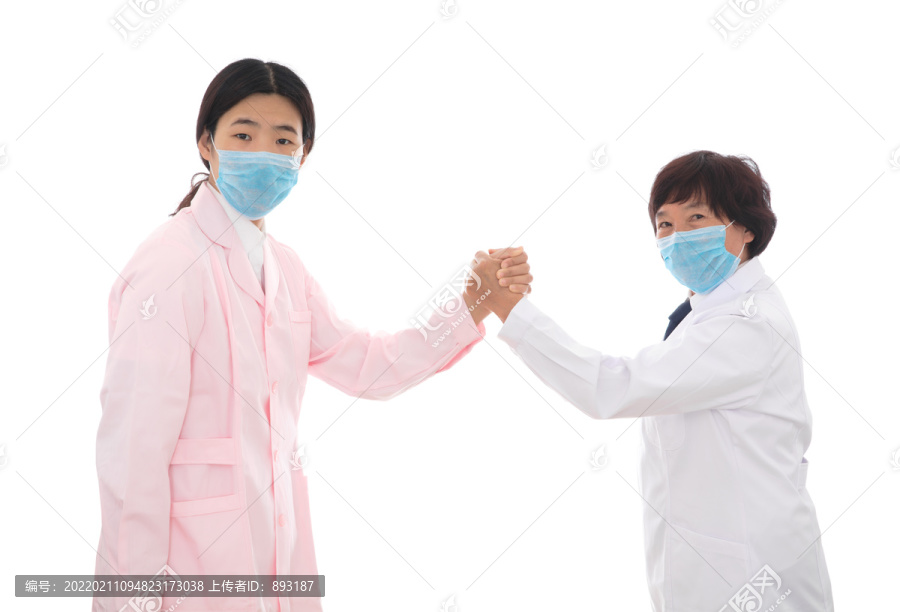 护士的手和医生的手紧握