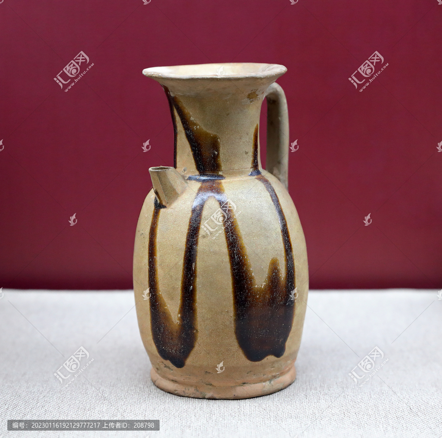 唐代长沙窑青釉褐彩瓷壶