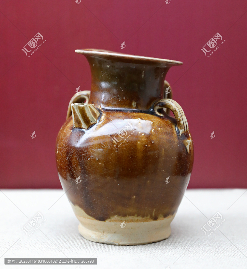 唐长沙窑褐釉双系瓷壶