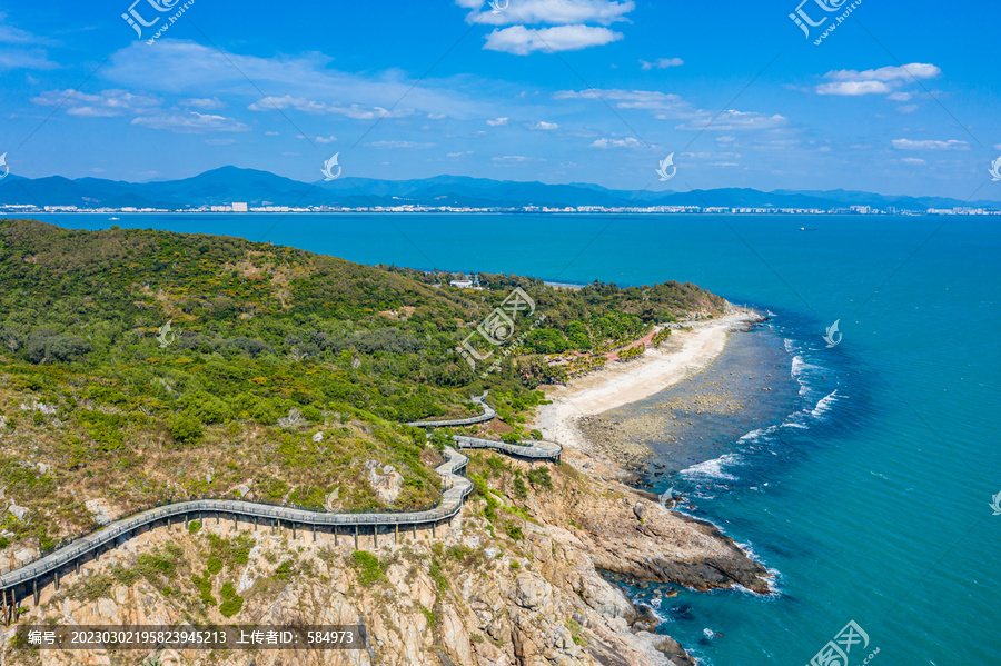 航拍三亚西岛海边山崖壁岩石