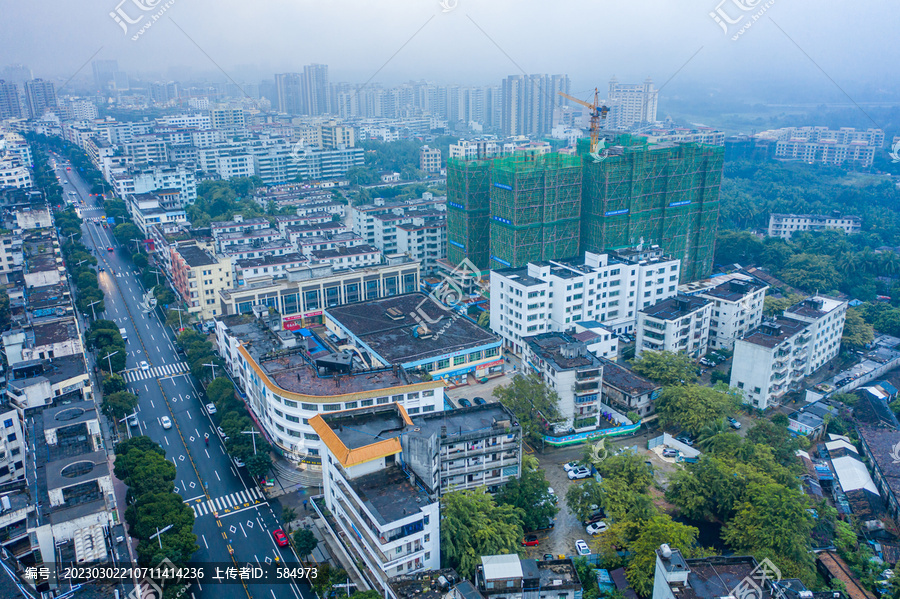 航拍海南文昌湿润雨雾笼罩城镇