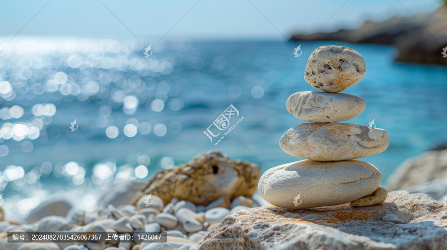 禪意卵石疊放礁石海邊背景