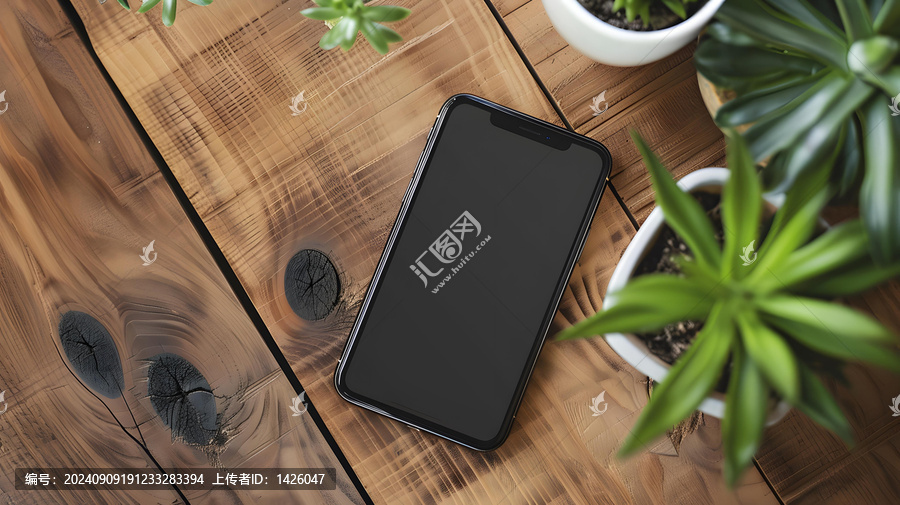 木質(zhì)桌面上的黑色手機(jī)