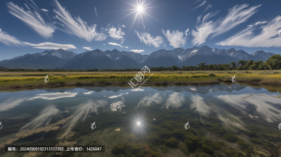 陽光穿過山間的云層照在湖面上