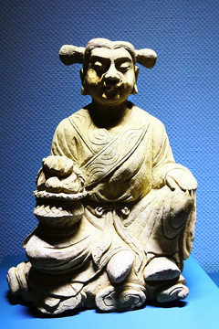 石雕蓝采和像