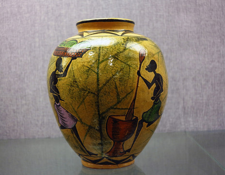 黄釉彩绘人物陶罐