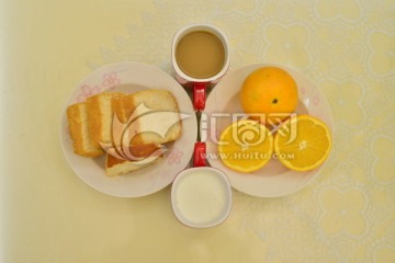 营养早餐甜橙与面包