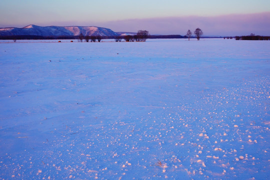 雪原夕照