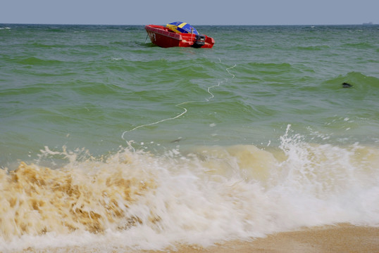 海浪 沙滩 快艇