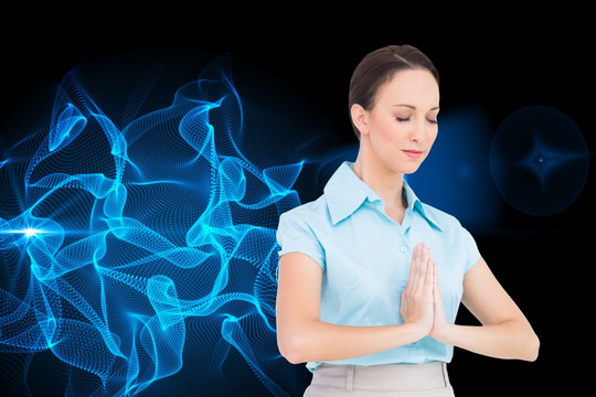 年轻女商人祈祷时的姿势