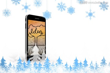 雪花和冷杉树中的智能手机