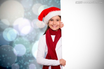 女孩戴着圣诞帽微笑的复合形象