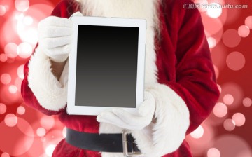 圣诞老人拿着平板电脑的复合图像