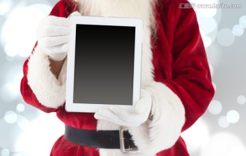 圣诞老人拿着平板电脑的复合图像