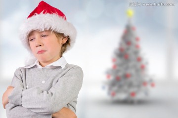 小男孩戴着圣诞帽的复合形象