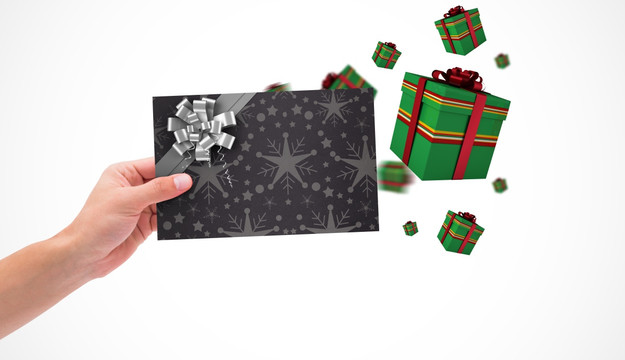 带弓的圣诞包装纸的手卡